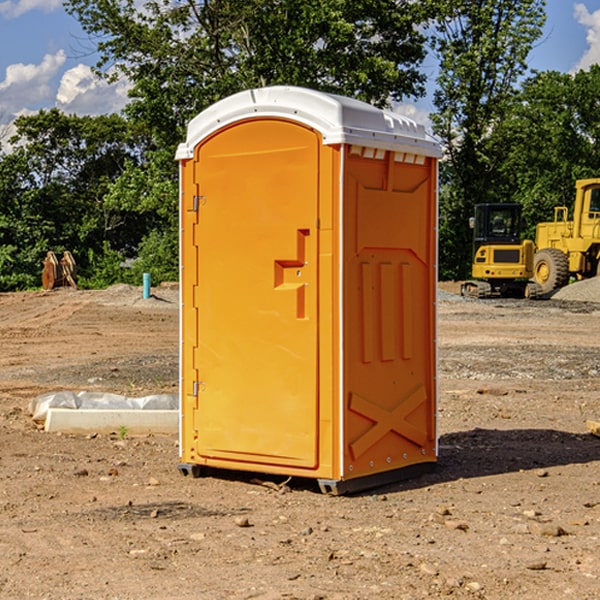 how often are the porta potties cleaned and serviced during a rental period in Spring Grove